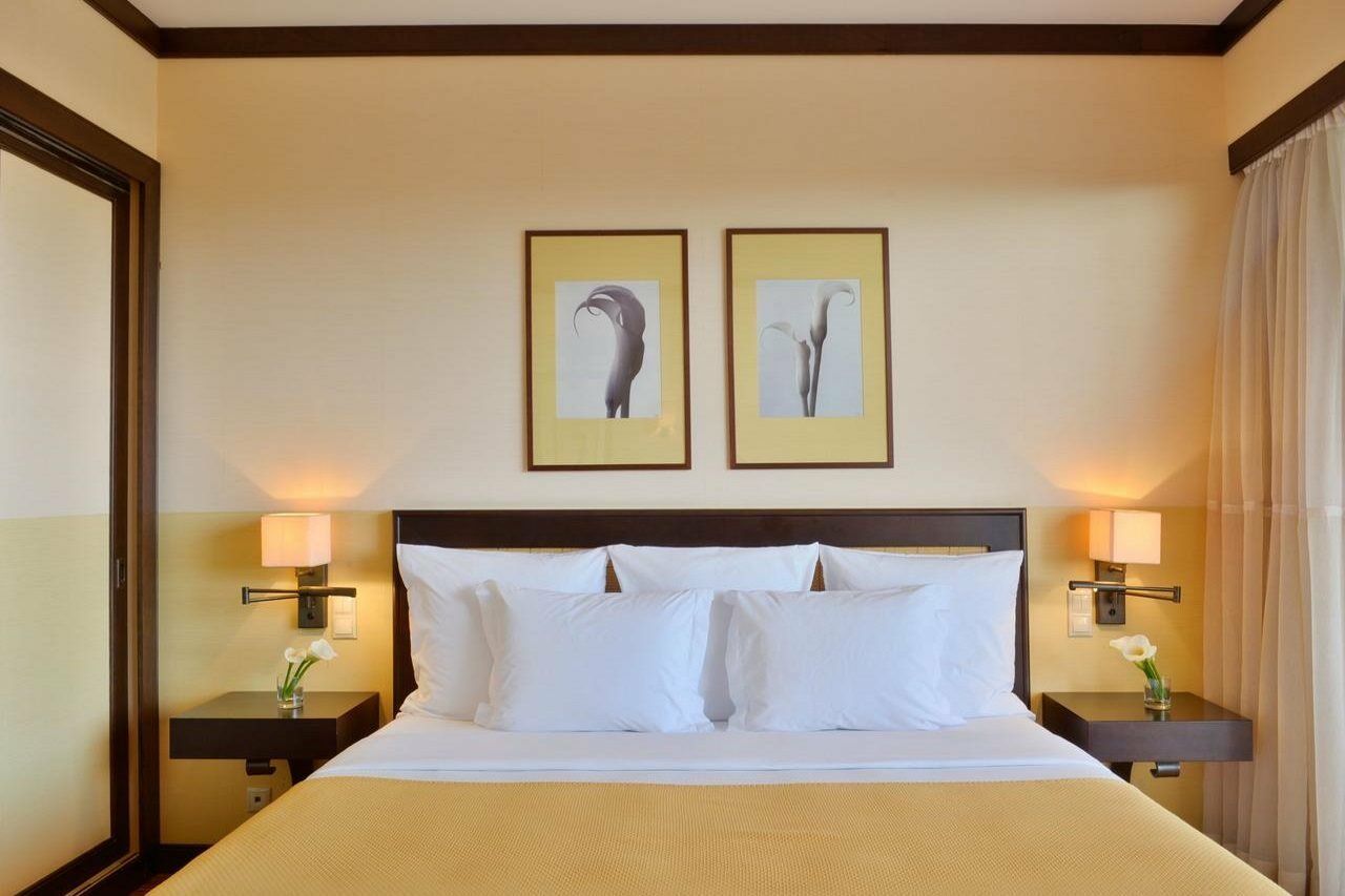 페스타나 빌라 솔 골프 앤 리조트 호텔 빌라모라 외부 사진 A bedroom at the Taj Bengal